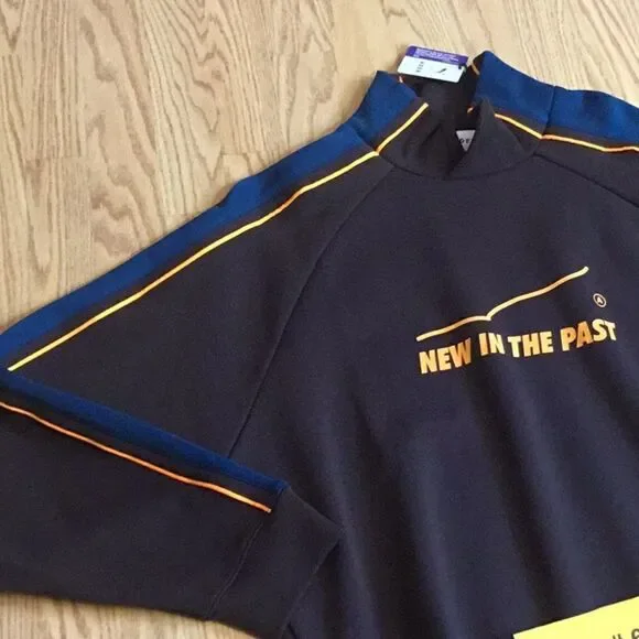 NWT PUMA sweatshirt in brown with blue & orange
